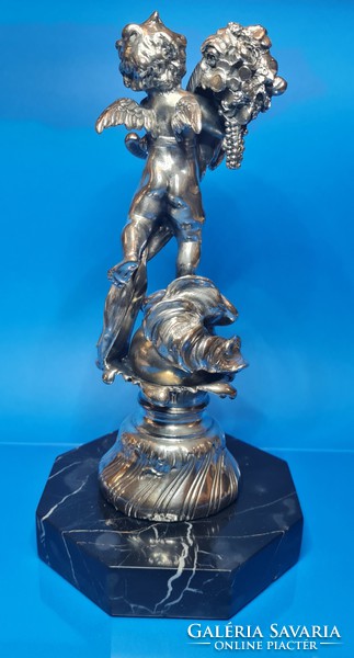 Silver putto statue