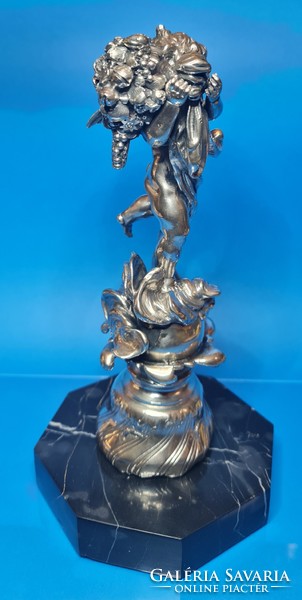 Silver putto statue