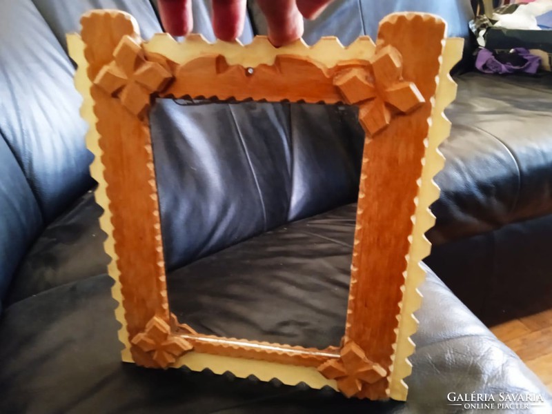 Old retro mirror with wooden frame