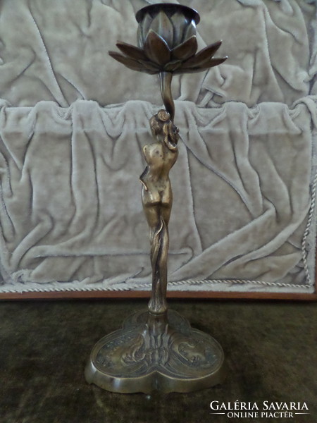 Art Nouveau turn-of-the-century female figure in a copper candlestick