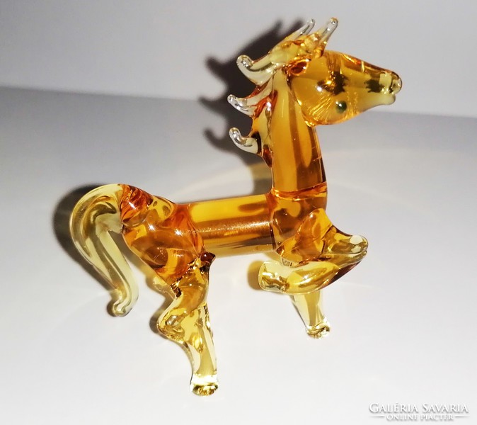 Glass galloping horse