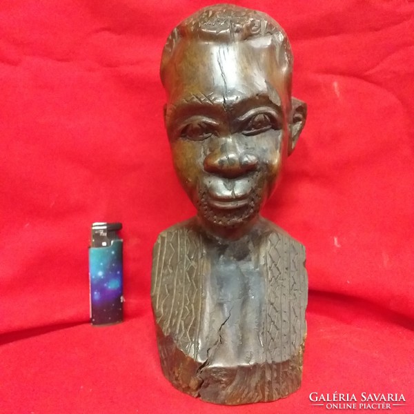 African carved wooden bust statue.