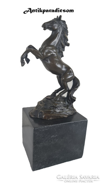 A447 prancing horse. Bronze statue on a marble base