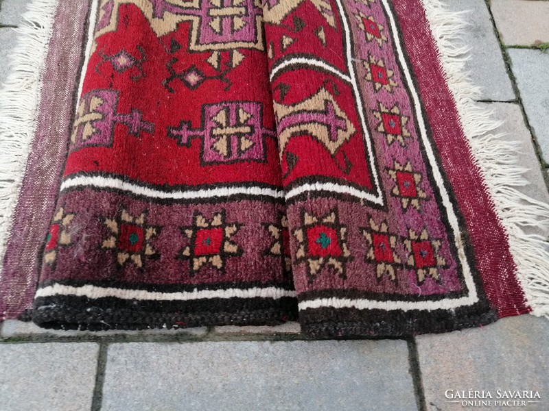 Afghan nomadic hand-knotted rug in nice clean condition. Negotiable!