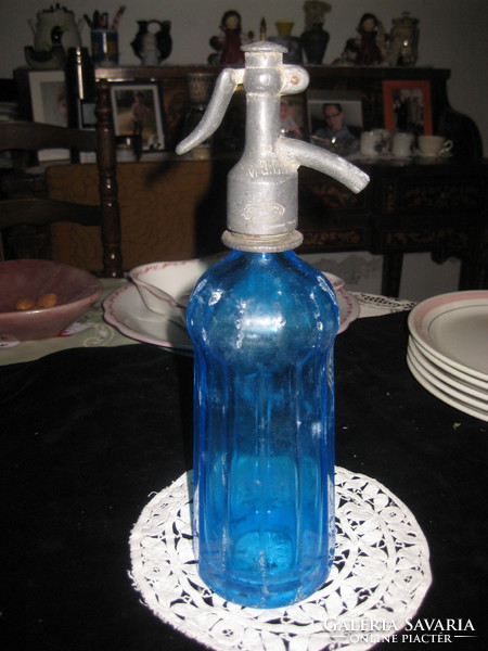 Blue soda bottle with lead head