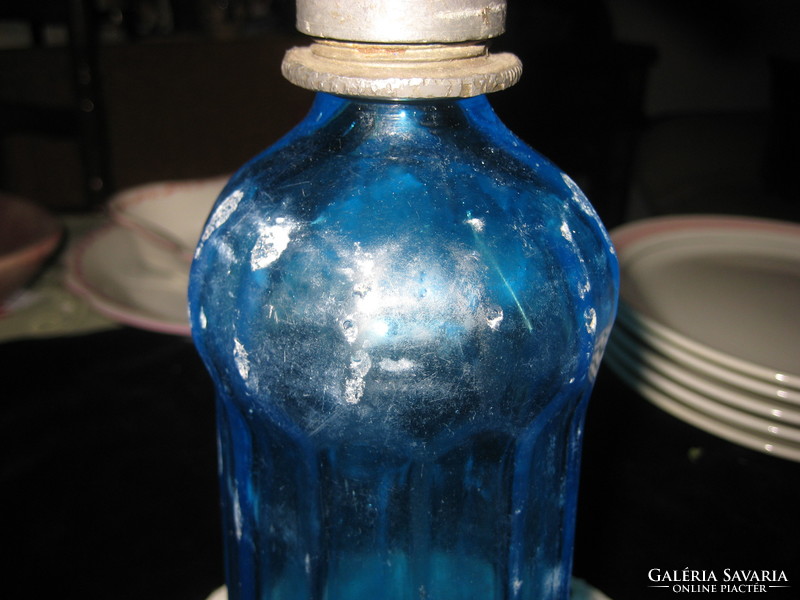 Blue soda bottle with lead head