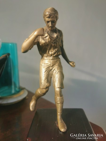 The football player with golden legs, soccer player, copper statue