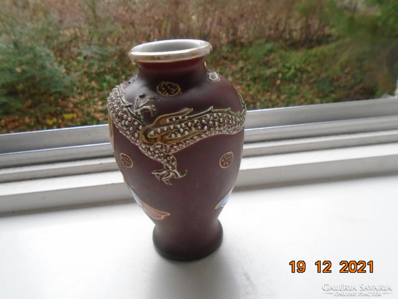 Satsuma moriage hand painted vase with plastic dragon, cannon and rakan pattern