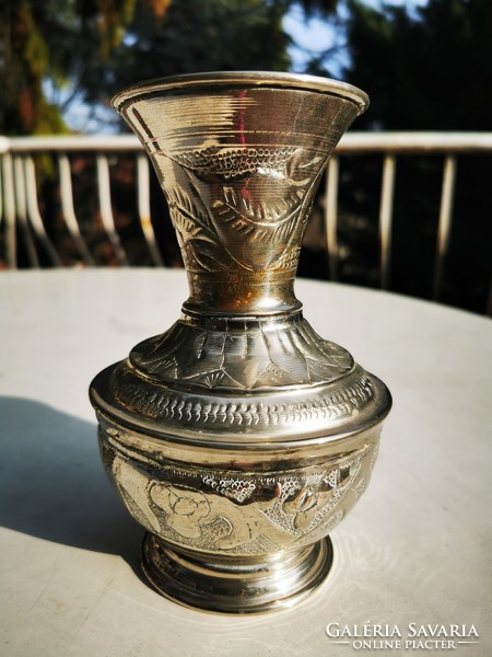Chiseled metal vase