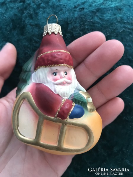 Christmas tree ornament on glass sleigh