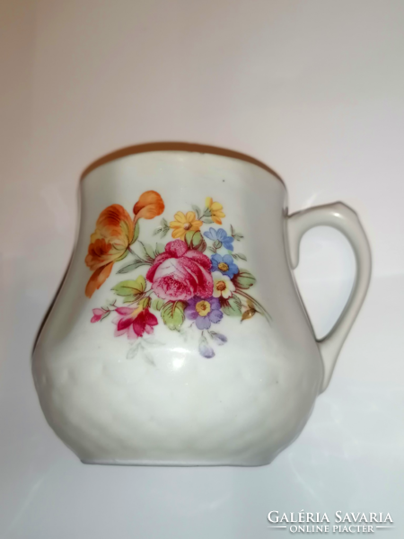 Aged quarry mug with tulips and floral pattern