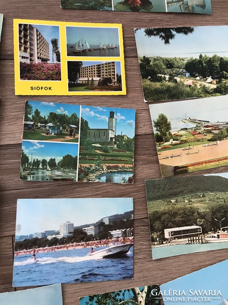 Lots of Balaton themed postcards with sailboats, sails, Siófok, etc.