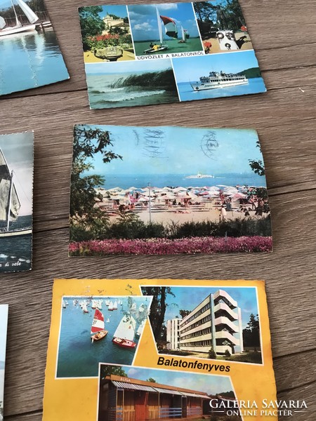 Lots of Balaton themed postcards with sailboats, sails, Siófok, etc.