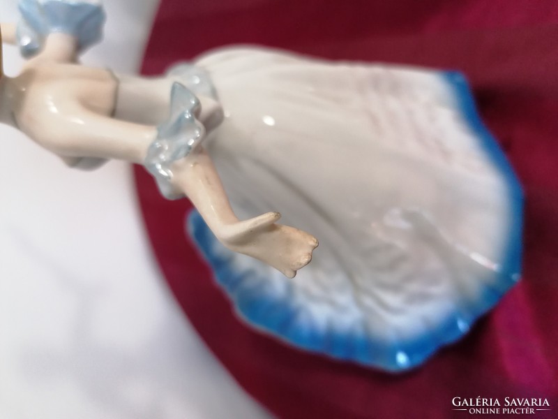 Graceful porcelain dancer lady