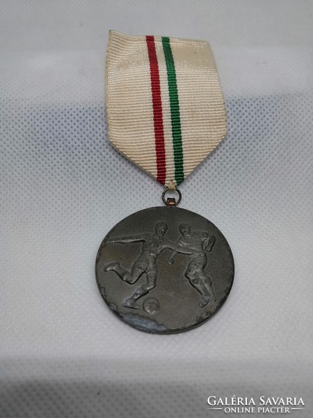 Old sports medal with chest strap 1961