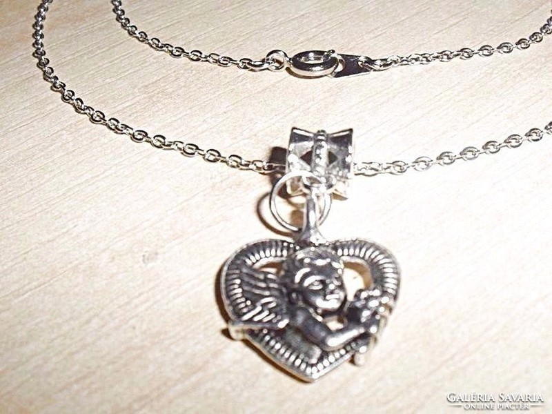 Angelic heart with flower Tibetan silver necklace - both sides are beautifully patterned