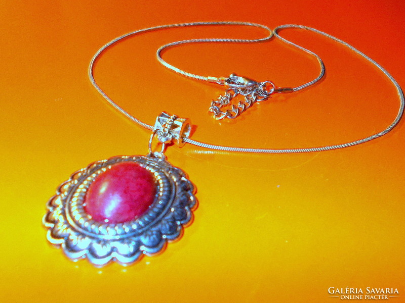 Ornate Tibetan silver necklace with coral stones