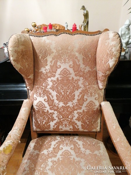 Antique armchair with handles, throne chair. Large, very old, structure is good stable.