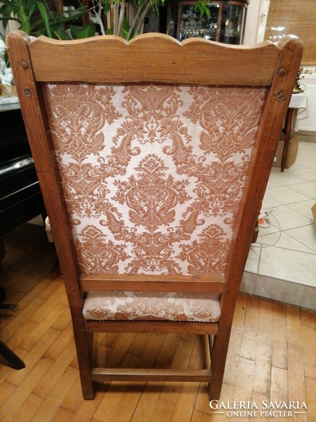 Antique armchair with handles, throne chair. Large, very old, structure is good stable.