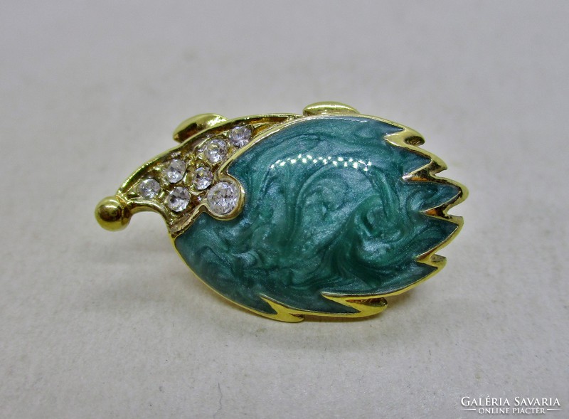 Wonderful antique gilded brooch with green stones