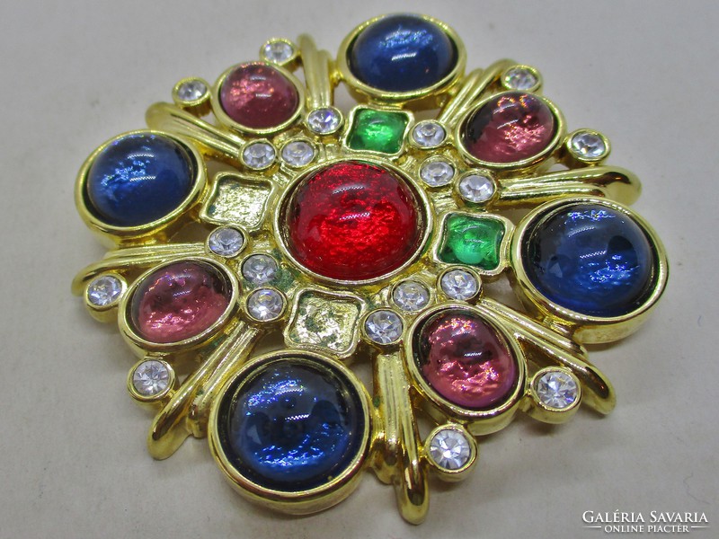 Old art deco gilded brooch with glass stones