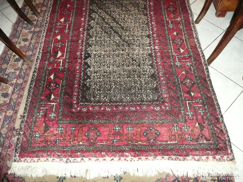 Rare eastern Turkestan middle boteh patterned hand-knotted rug with herat border