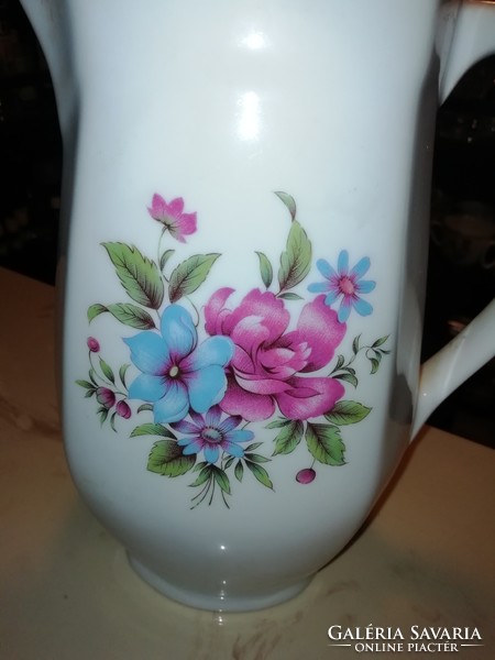 Old porcelain jug with spout marked