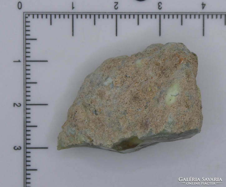 Natural green opal nugget with pale orange seeds in the middle. Collectible mineral. 15 Grams