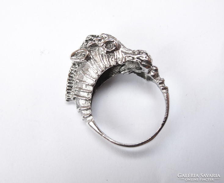 Showy silver ring with seahorse.