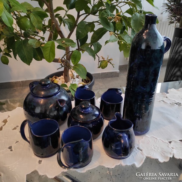 Unusual, decorative, dark blue ceramic tea/coffee set with ingredients and vase