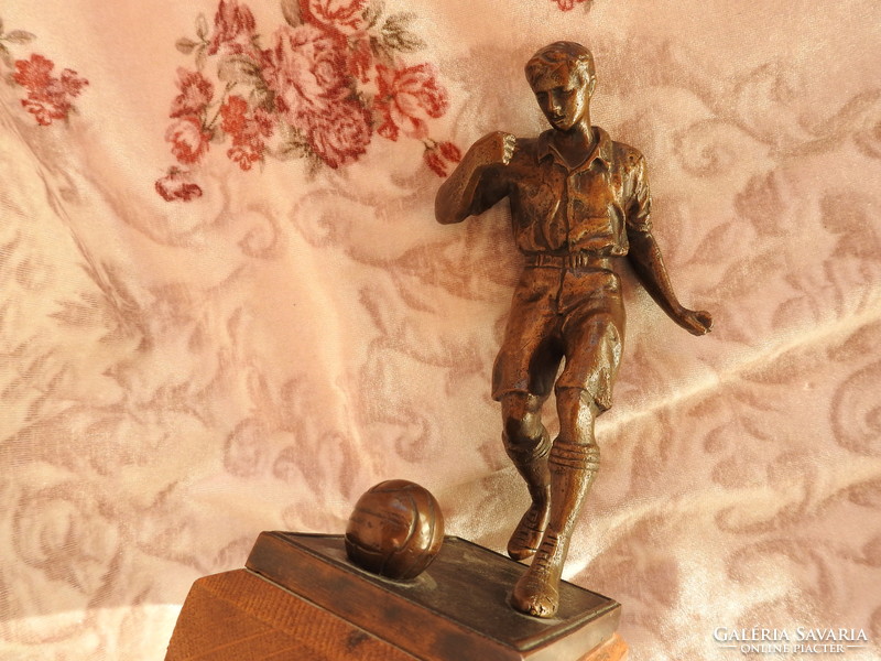 Bronze soccer player statue - indicated