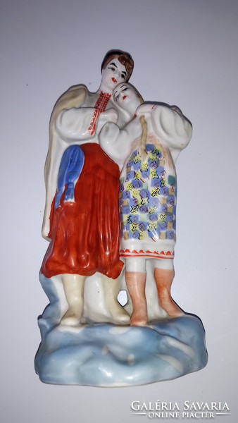 Couple in love in Russian folk costume.
