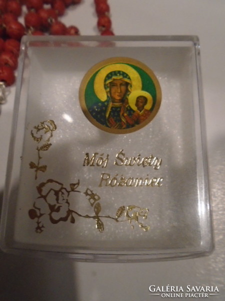 Amber Mary's garland in a rosary box