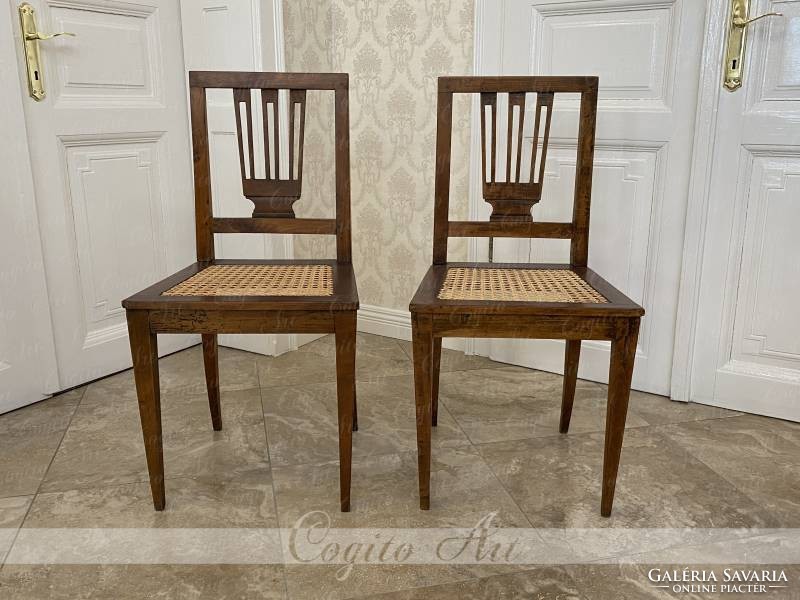 1780 A pair of braided chairs is restored