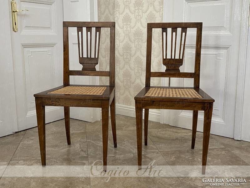 1780 A pair of braided chairs is restored