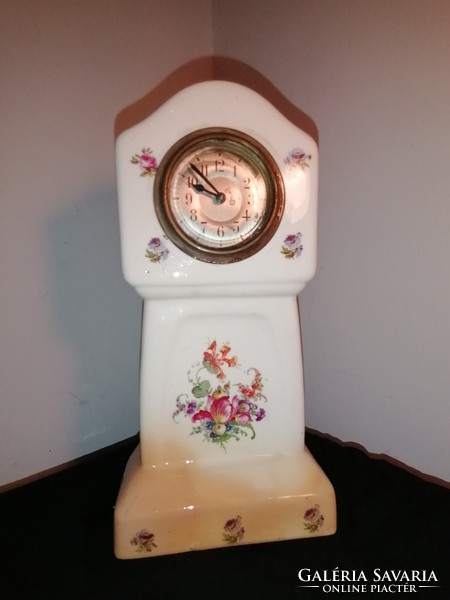 Antique table clock in a ceramic case