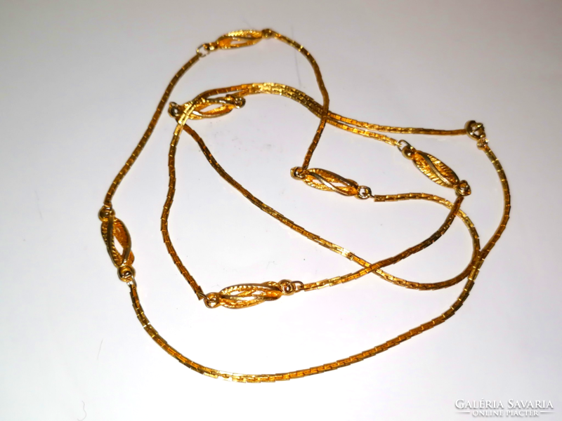 Gold colored twisted long necklace 137.