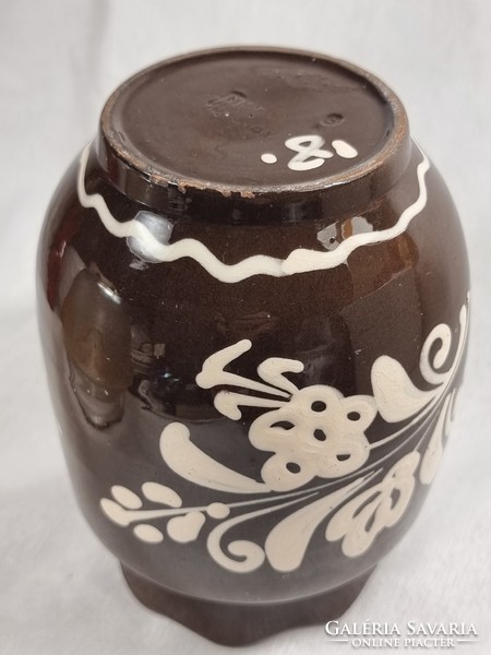 Painted-glazed ceramic vase, made in hungary with embossed mark, with ruffled border.Presumably h.M.V.