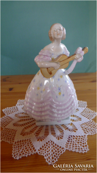 Porcelain statue of Heron in a pink dress from Herend