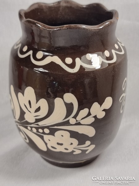 Painted-glazed ceramic vase, made in hungary with embossed mark, with ruffled border.Presumably h.M.V.