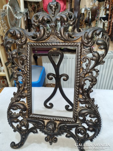 Old cast iron picture holder