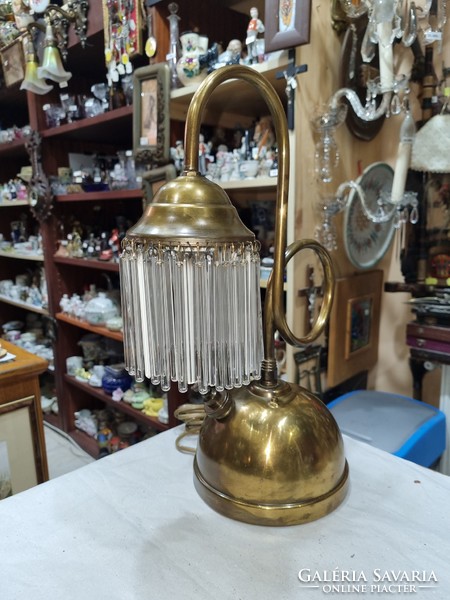 Old refurbished copper table lamp with glass wand