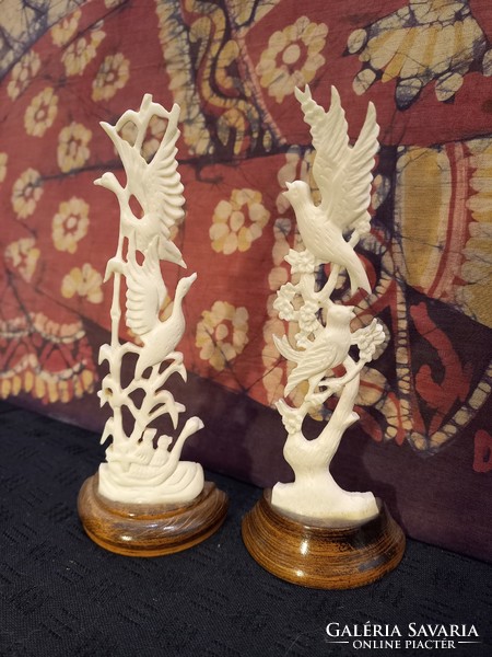 Pair of hand carved beef sculptures