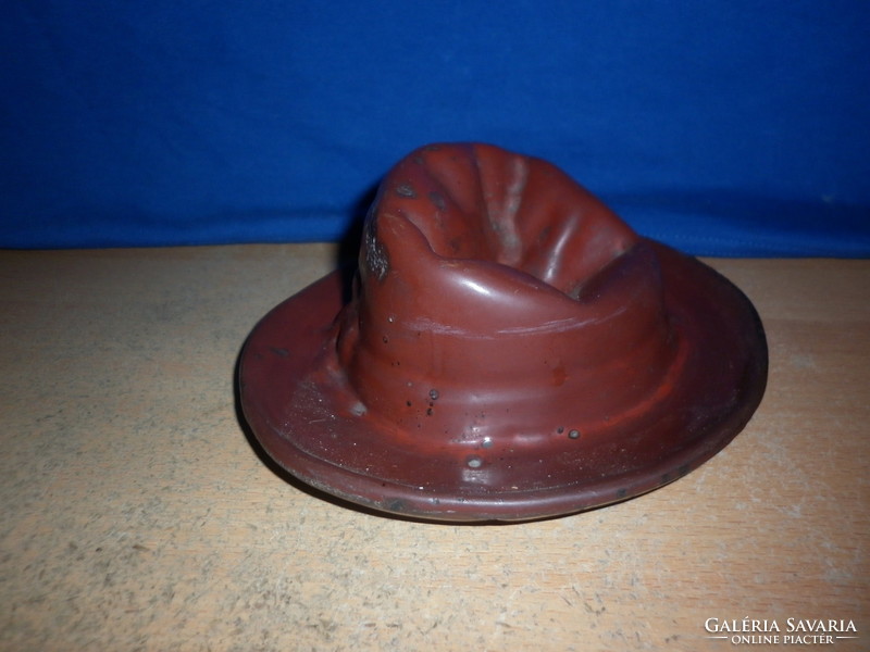 Ashtray in the shape of an old cast iron hat