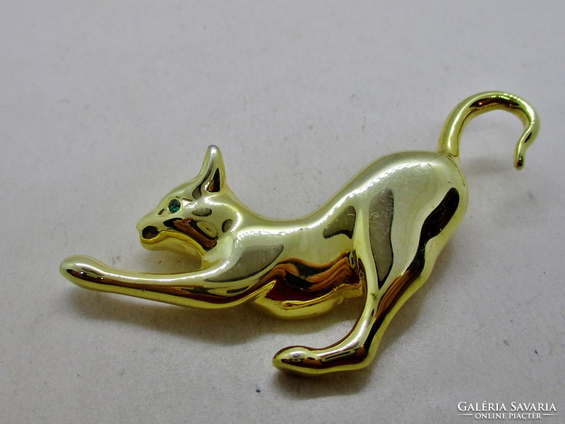 Wonderful old gilded big cat brooch with green eyes