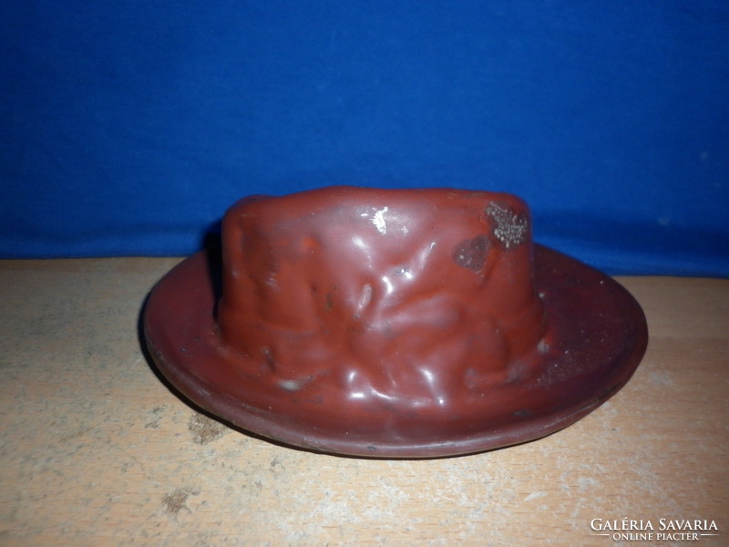 Ashtray in the shape of an old cast iron hat