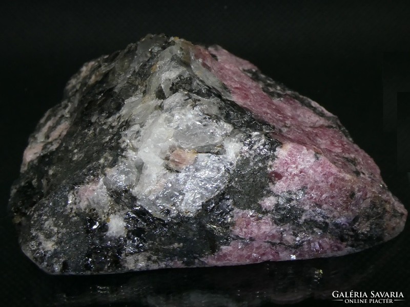 A piece of natural, partially polished rhodonite. Collection or jewelry base material. 165 Grams.