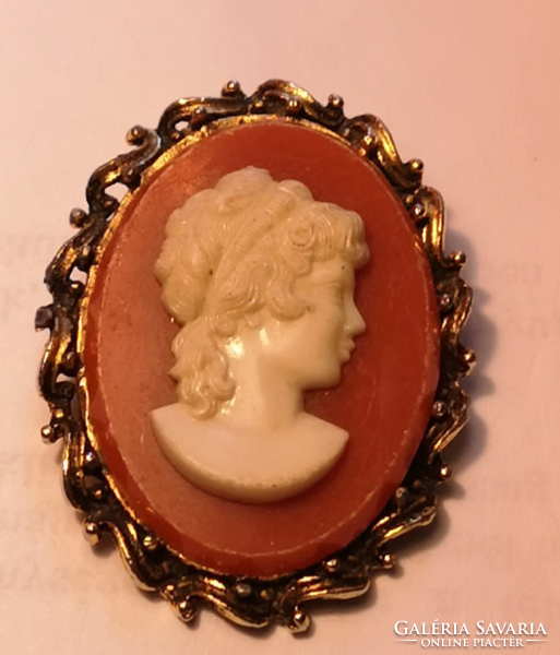 Antique cameo in metal frame