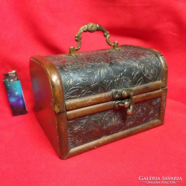 Wooden chest box with copper, printed leather decoration.