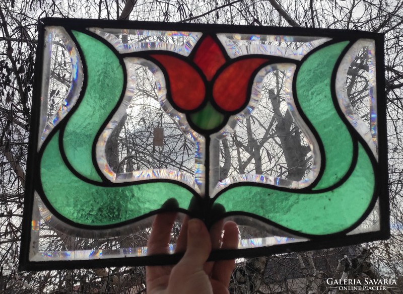 The case is Art Nouveau lead glass, tiffany style, colored glass, and polished glass! Art Nouveau